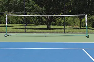 Roll-a-Net - Sturdy, Portable Tennis Net | Easy Set-Up and Quick Storage | for Tennis, Badminton, Indoors and Outdoors | 4-inch Locking Wheels | Nylon Duffel Bag on Wheels Included